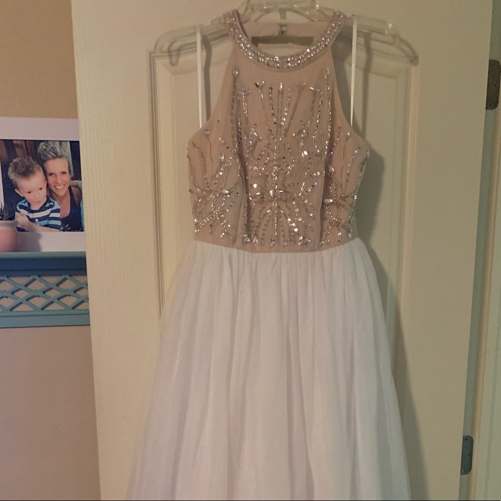 White and cream colored A-line evening gown